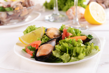 Tasty seafood on plate on table close-up
