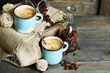 Beautiful composition with tasty cappuccino on wooden table