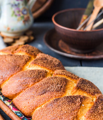 large wicker buns with cinnamon and golden brown