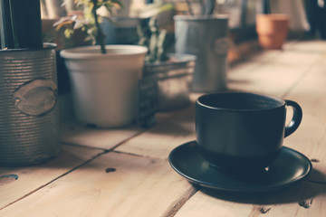 A coffee cup displayed in the window vintage color