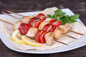Grilled meat and vegetables on skewer