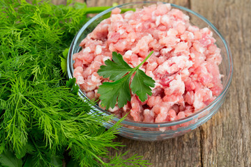minced meat on wooden table