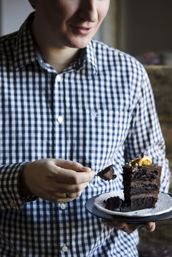 Man Eating Chocolate Cake