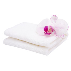 Obraz na płótnie Canvas Towel with flower isolated on white
