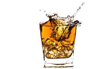 water splash in glass isolated on white
