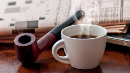 Newspaper and coffee
