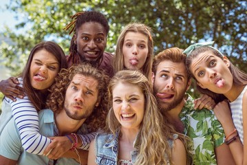 Silly young friends posing together