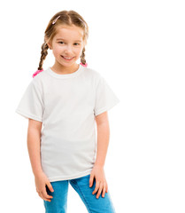 cute little girl in a white T-shirt and blue jeans