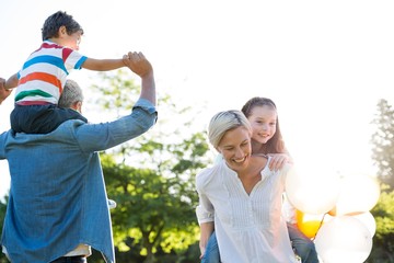 Happy family playing at the park © WavebreakMediaMicro