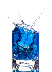 water splash in glass isolated on white