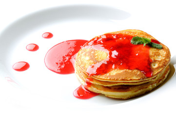 pancakes on a white plate