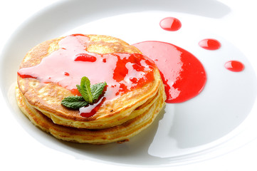 pancakes on a white plate