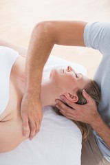 Fototapeta na wymiar Woman receiving neck massage