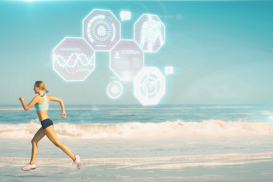 Composite image of fit woman jogging on the beach