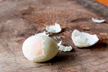Fototapeta na wymiar Shell boiled egg on wood background