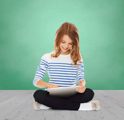 happy little student girl with tablet pc