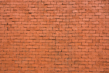 Fototapeta na wymiar Background of old red vintage brick wall