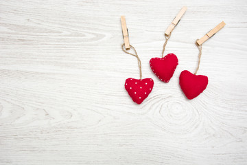 Red hearts on wood