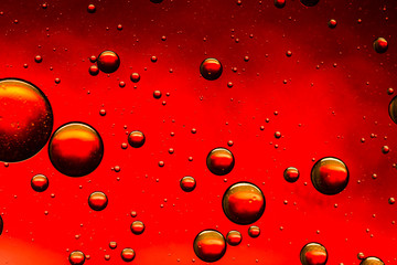 Red and gold oil and water abstract