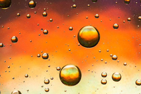 Orange and gold oil and water abstract