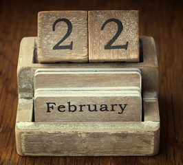 A very old wooden vintage calendar showing the date 22nd Februar