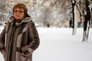 Mature woman in winter clothes