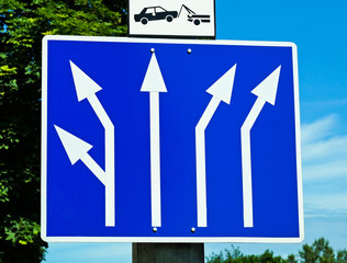 Road lanes signs with directional arrows