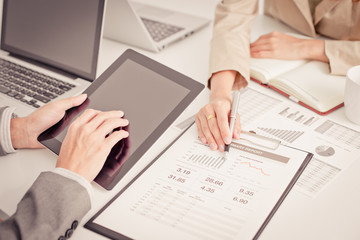 Business people discussing the charts and graphs showing the res