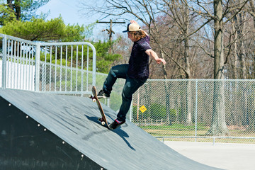 Skateboarder On a Skate Ramp