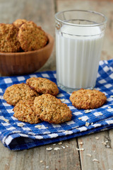 Homemade oatmeal cookies and a glass of milk