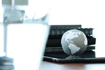 hand drawn texture globe on digital tablet  computer as internet