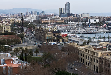 Fototapeta premium Harbor district with Columbus in Barcelona, Spain