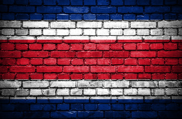 Brick wall with painted flag of Costa Rica