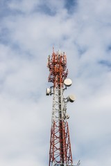 telecommunications tower with many satellite dish