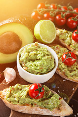 Guacamole with bread and avocado