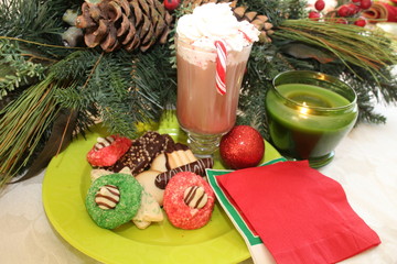 Hot chocolate with peppermint sticks and cookies