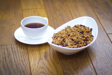 white plate with flakes white cup and saucer