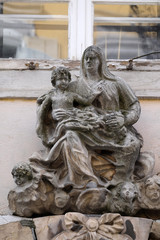Virgin Mary with baby Jesus, house facade in Graz, Austria