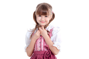 Mädchen im Dirndl lächelt süß Porträt