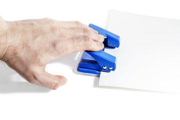 Men's hand stapler staples multiple sheets of paper