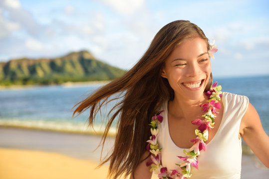 Hawaii beach woman happy on Hawaiian holidays