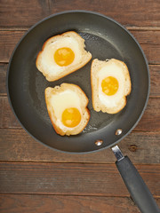 Fried eggs in a plate on the table
