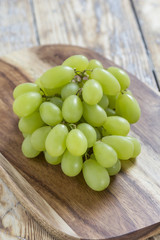 grapes on wooden board