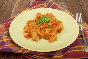 Lunch cooked meat with vegetables and spices