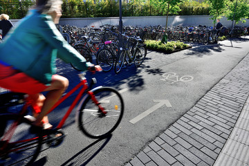 Fototapeta na wymiar Bicyclist in bike lane