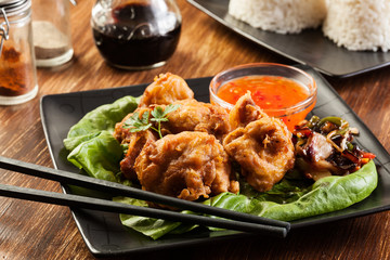 Fried chicken pieces in batter