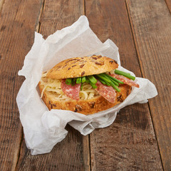 Sandwich with sausage and vegetables