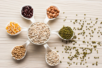 collection set of beans, legumes, peas, lentils on ceramic spoon
