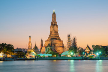 Fototapeta premium Night view of Wat Arun temple and Chao Phraya River, Bangkok, Th
