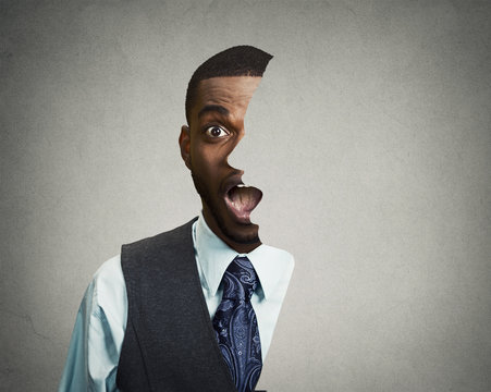 Fototapeta Shocked, surprised business man on grey wall background 